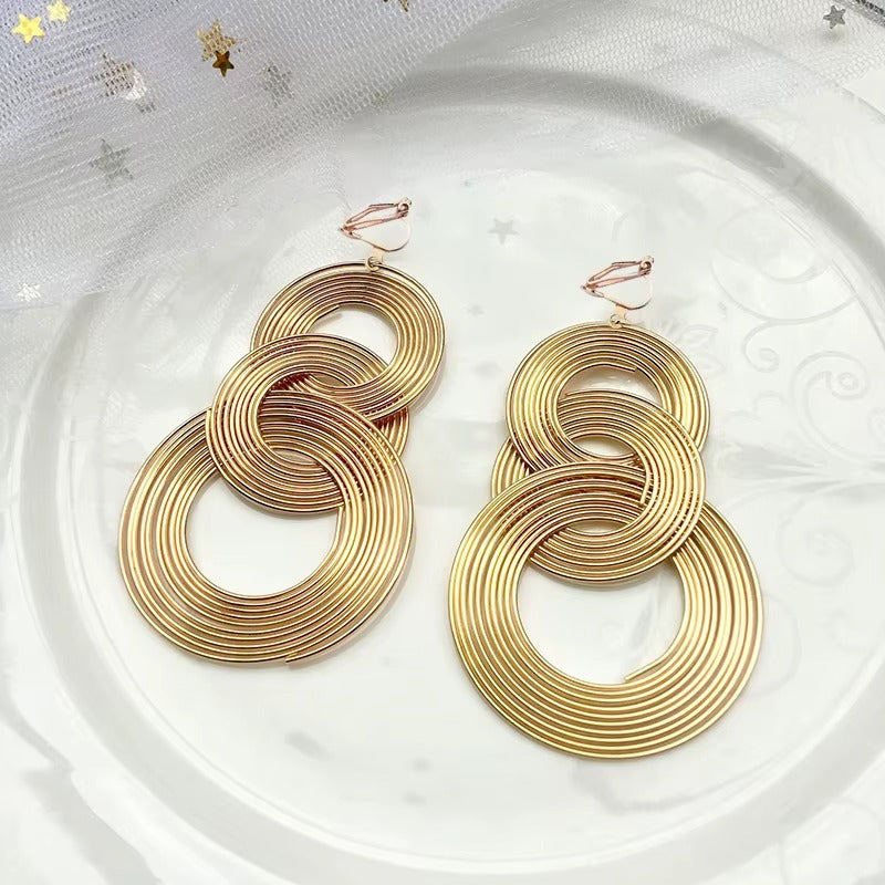 Orecchini Clip Lunghi a 3 Cerchi – Geometrici Oro Statement