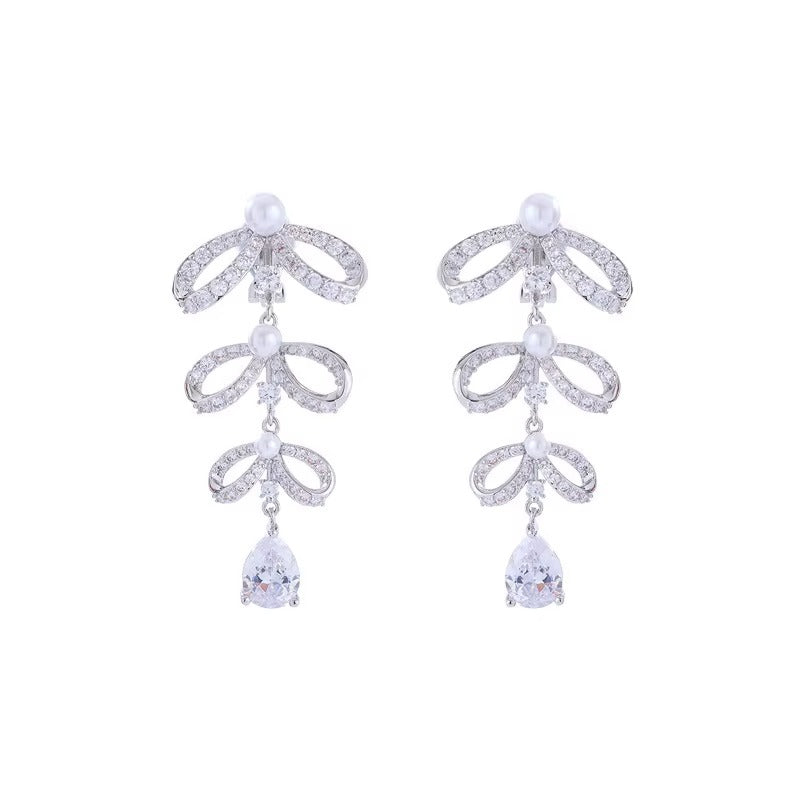 Orecchini Clip di Lusso con Perla Waterdrop e Nodo a Farfalla – Design Elegante Senza Fori